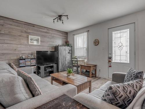 Living room - 366  - 368 Rue Racine, Québec (La Haute-Saint-Charles), QC - Indoor Photo Showing Living Room With Fireplace