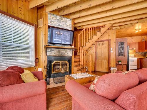 Vue d'ensemble - 6884 Rue De La Rivière, Val-Morin, QC - Indoor Photo Showing Living Room With Fireplace
