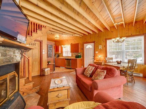 Vue d'ensemble - 6884 Rue De La Rivière, Val-Morin, QC - Indoor Photo Showing Living Room With Fireplace