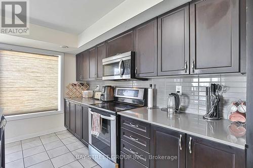 2 - 161 Frederick Tisdale Drive, Toronto, ON - Indoor Photo Showing Kitchen With Upgraded Kitchen