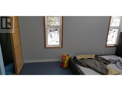 7987 24 Highway, Bridge Lake, BC - Indoor Photo Showing Bedroom