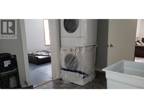 7987 24 Highway, Bridge Lake, BC - Indoor Photo Showing Laundry Room