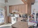 Cuisine - 6430  - 6432 Boul. Témiscamingue, Rouyn-Noranda, QC  - Indoor Photo Showing Kitchen With Double Sink 