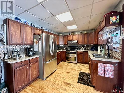 23 Ramsay Street, Campbellton, NB - Indoor Photo Showing Kitchen With Double Sink