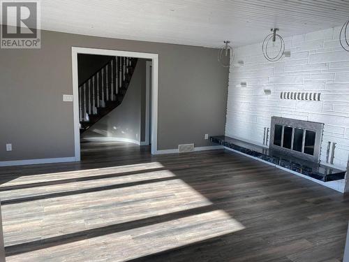 5608 214 Road, Dawson Creek, BC - Indoor Photo Showing Other Room With Fireplace
