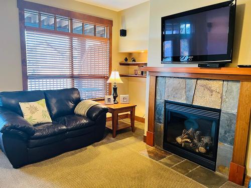 27 - 2598 Mountainview Crescent, Invermere, BC - Indoor Photo Showing Living Room With Fireplace