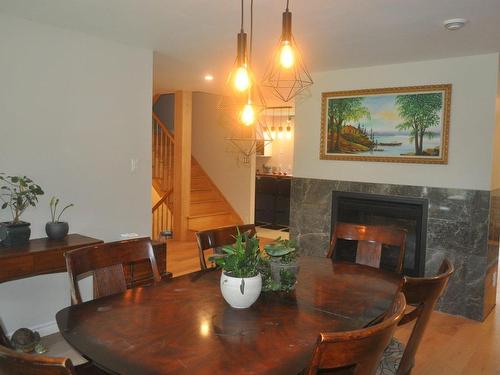 Dining room - 1410 Rue St-Paul, Farnham, QC - Indoor Photo Showing Dining Room With Fireplace