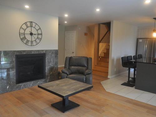Salon - 1410 Rue St-Paul, Farnham, QC - Indoor Photo Showing Living Room With Fireplace