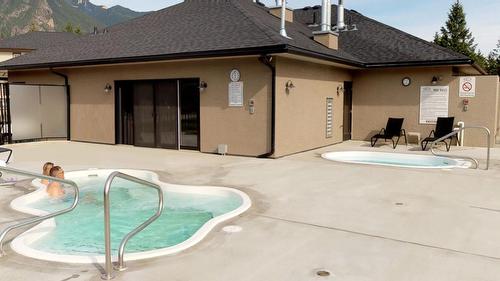 415 O2 - 400 Bighorn Boulevard, Radium Hot Springs, BC - Outdoor With In Ground Pool With Exterior