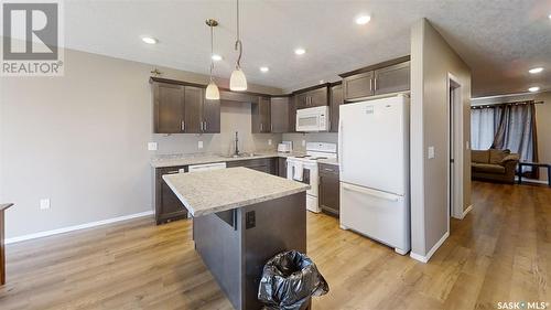 712 713  714  716 Columbia Avenue, Kerrobert, SK - Indoor Photo Showing Kitchen With Double Sink