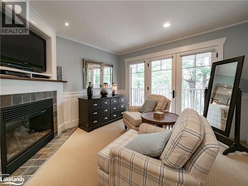 1020 Birch Glen Road Unit# V15 W4 P5, Baysville, ON - Indoor Photo Showing Living Room With Fireplace