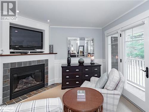 1020 Birch Glen Road Unit# V15 W4 P5, Baysville, ON - Indoor Photo Showing Living Room With Fireplace