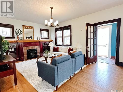 314 2Nd Avenue Ne, Swift Current, SK - Indoor Photo Showing Living Room With Fireplace