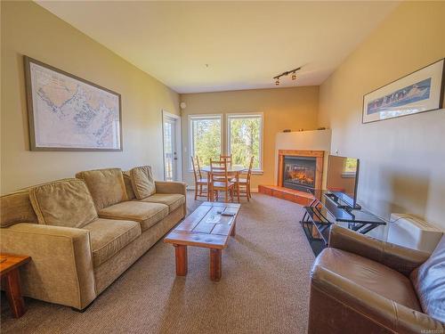 508-1971 Harbour Dr, Ucluelet, BC - Indoor Photo Showing Living Room With Fireplace