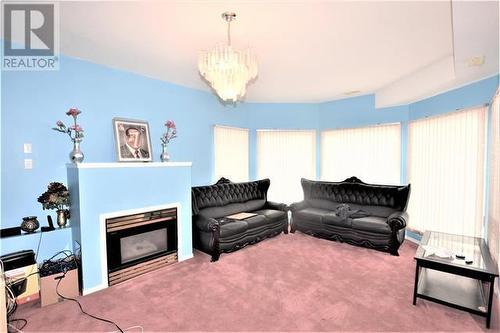 4904 Valleyview Place, Vernon, BC - Indoor Photo Showing Living Room With Fireplace