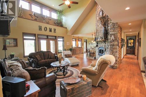 7794 219 Road, Dawson Creek, BC - Indoor Photo Showing Living Room With Fireplace