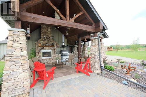 7794 219 Road, Dawson Creek, BC - Outdoor With Fireplace