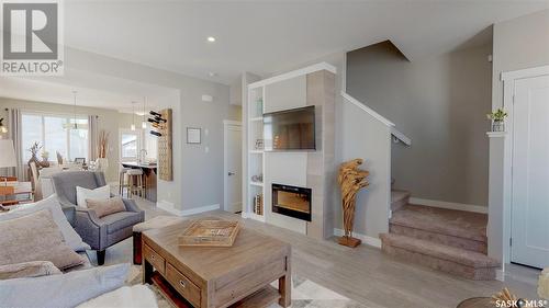 4406 Buckingham Drive, Regina, SK - Indoor Photo Showing Living Room With Fireplace