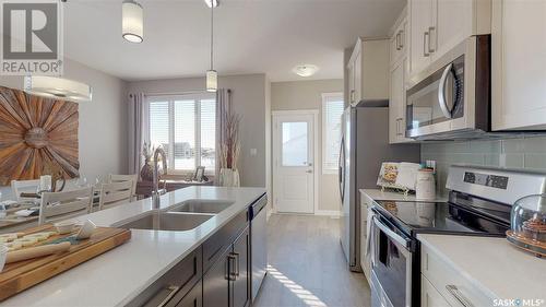 4406 Buckingham Drive, Regina, SK - Indoor Photo Showing Kitchen With Double Sink With Upgraded Kitchen