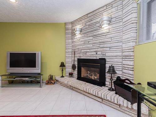 Sous-sol - 6230  - 6232 30E Avenue, Montréal (Rosemont/La Petite-Patrie), QC - Indoor Photo Showing Living Room With Fireplace