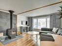 Living room - 507 Ch. Des Habitations-Des-Monts, Saint-Sauveur, QC  - Indoor Photo Showing Living Room With Fireplace 