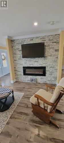 1 Isaac'S Point Street, Marystown, NL - Indoor With Fireplace