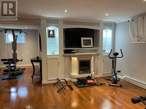 13 Stacey Crescent, Stephenville, NL - Indoor Photo Showing Gym Room With Fireplace