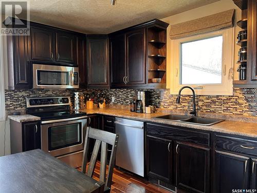 203 Bergmann Avenue, Wynyard, SK - Indoor Photo Showing Kitchen With Double Sink