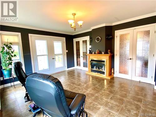 37 Cloutier, Saint-Jacques, NB - Indoor Photo Showing Living Room With Fireplace