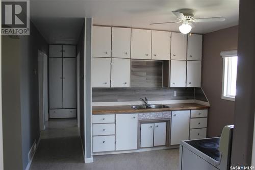 49 1St Street, Tompkins, SK - Indoor Photo Showing Kitchen With Double Sink
