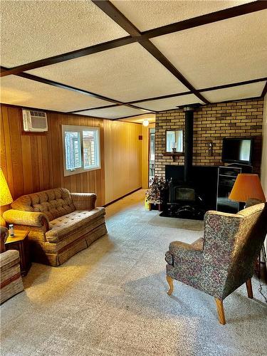 329 Elm Drive, Oak Lake Beach, MB - Indoor With Fireplace