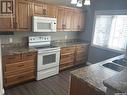 202 123 Balmoral Street E, Yorkton, SK  - Indoor Photo Showing Kitchen With Double Sink 