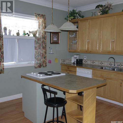 6 4Th Avenue Sw, Weyburn, SK - Indoor Photo Showing Kitchen With Double Sink