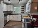 713 Beharrel Street, Oxbow, SK  - Indoor Photo Showing Kitchen With Double Sink 