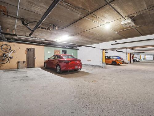 Stationnement - 102-800 Boul. De Montarville, Boucherville, QC - Indoor Photo Showing Garage