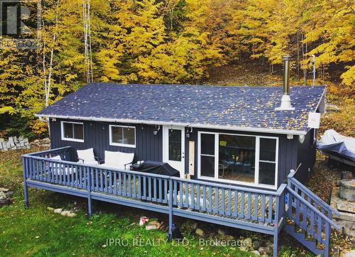 1093 Grace River Rd, Highlands East, ON - Outdoor With Deck Patio Veranda
