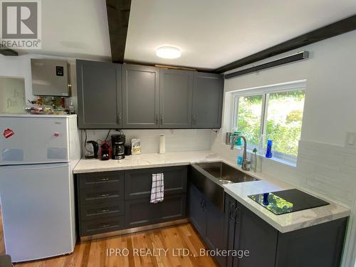 1093 Grace River Road, Highlands East, ON - Indoor Photo Showing Kitchen