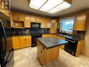 218 Collins Avenue, Springside, SK  - Indoor Photo Showing Kitchen With Double Sink 