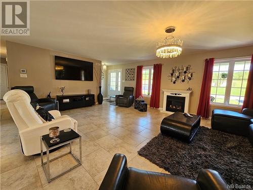 37 Guerrette Street, Sainte-Anne-De-Madawaska, NB - Indoor Photo Showing Living Room With Fireplace