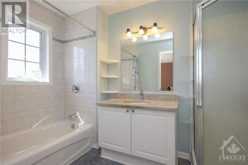 4 piece ensuite with Granite counters and tile floors - 194 Lilibet Crescent, Ottawa, ON - Indoor Photo Showing Bathroom