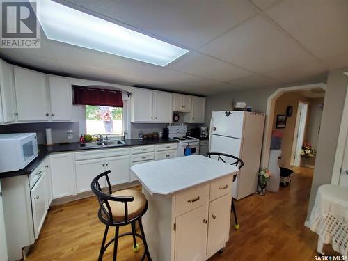 38 Warren Street, Redvers, SK - Indoor Photo Showing Kitchen With Double Sink