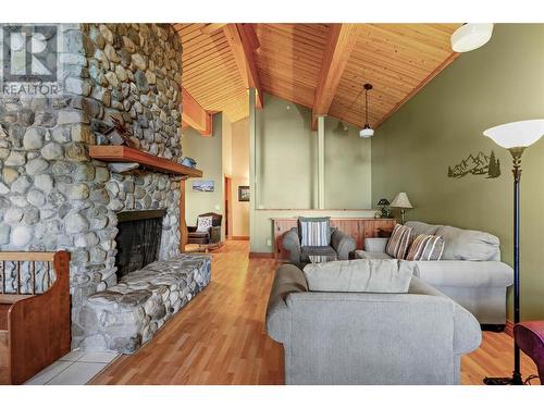 6395 Whiskey Jack Road, Big White, BC - Indoor Photo Showing Living Room With Fireplace