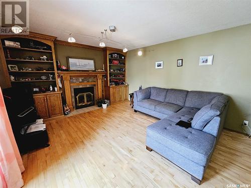 611 Colonel Otter Drive, Swift Current, SK - Indoor Photo Showing Living Room With Fireplace