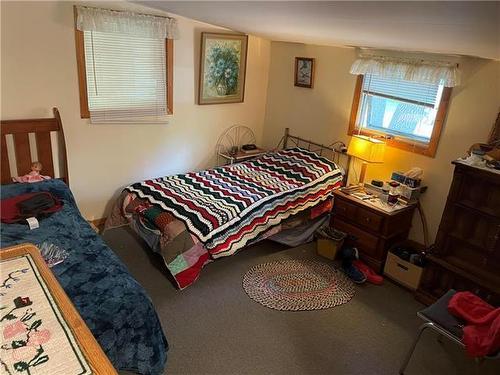 219 Elm Drive, Oak Lake Beach, MB - Indoor Photo Showing Bedroom