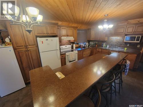 #64 Suffern Lake, Senlac Rm No. 411, SK - Indoor Photo Showing Kitchen With Double Sink