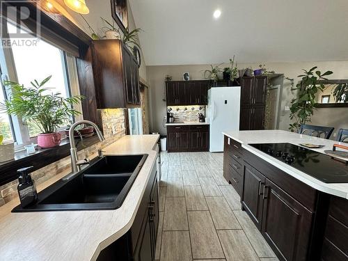 9057 225 Road, Dawson Creek, BC - Indoor Photo Showing Kitchen With Double Sink