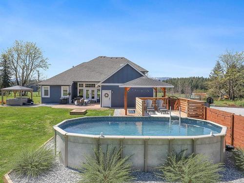 2495 Graham Rd, Courtenay, BC - Outdoor With Above Ground Pool With Backyard
