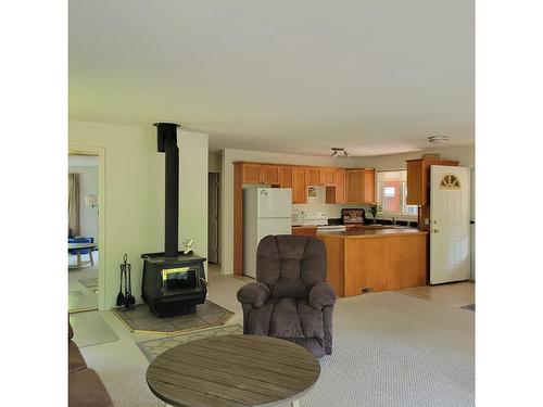 436 Bayview Road, Nakusp, BC - Indoor With Fireplace