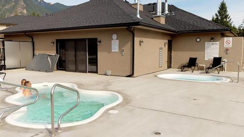 523 B - 500 Bighorn Boulevard, Radium Hot Springs, BC - Outdoor With In Ground Pool With Exterior
