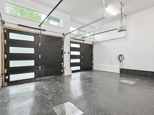 Garage - 220  - 218 Rue Jeanne-Servignan, Carignan, QC - Indoor Photo Showing Garage